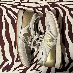 New Balance Women's Gold and White Sneakers